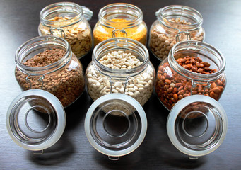 Bean grains in glass jars in the kitchen