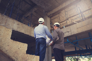 Engineer Architect working at Construction Site, Vintage Effect