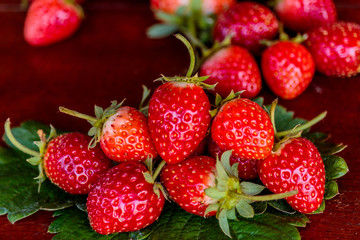 Fresh strawberries on old table wood