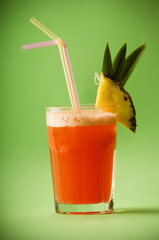 Cold orange cocktail with pineapple 