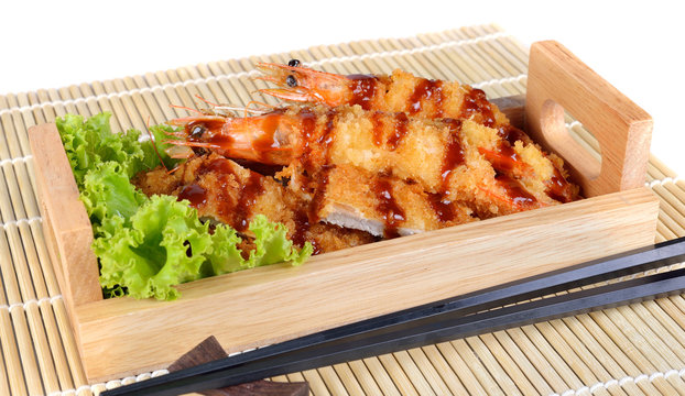 Japanese food - fried tempura shrimps and fried pork.