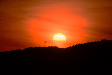 Beautiful big sunset over the mountains.