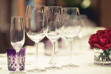 wine glass setup on the table in luxury dinner party, Blurry bac