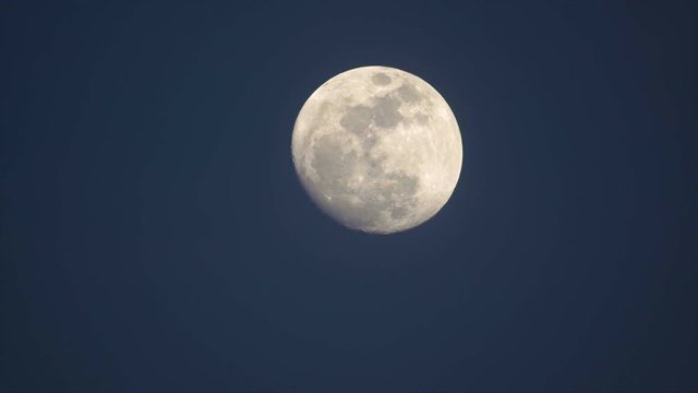 full moon up at twilight