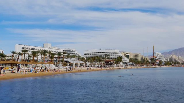 Eilat's coastline, known for it's shops and luxury hotels and restaurants, located and the gulf of the red sea.