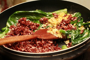 Cooking , Fried organic black rice  with Thai sour sausage and k