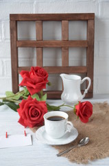 Valentines day breakfast with coffee, candy cane and flowers
