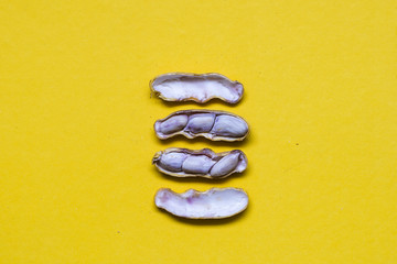 Boiled peanut on yello background.