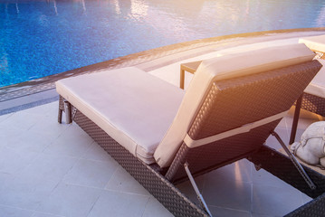 pool bed near swimming pool in tropical resort