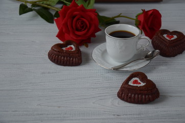 Valentines day coffee and cupcakes with decorations copy space