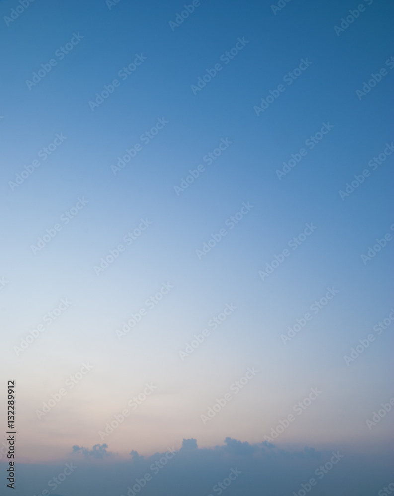 Wall mural sunset with soft blue sky background