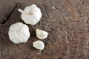 Garlic cloves on old wood