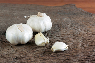 Garlic cloves on old wood