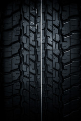 Clean Tyre, black new shiny car tire pattern texture in dark color tone