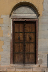 Fototapeta na wymiar Antique wooden door frame from Jaipur City Palace