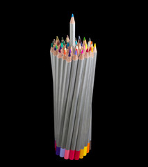 Bunch of colored pencils with one pencil partly pull out