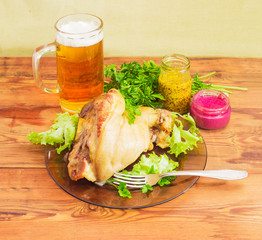 Baked ham hock, condiments and lager beer