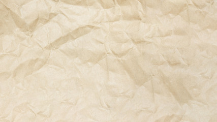 Recycled crumpled brown paper texture, paper background for design with copy space for text or image.