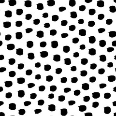 Seamless black and white vector free hand doodle texture with dots, dry brush ink art.