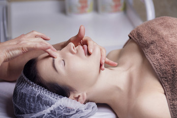 Fototapeta na wymiar face calming massage hands spa relax