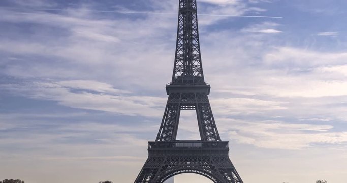 Time lapse tilt up view of the iconic Eiffel tower in Paris, France