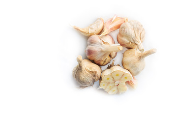 Garlic ordinary, seasoning for pilaf on a white background.
