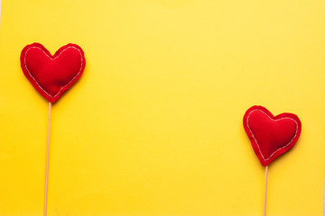 red heart pads on a yellow background, texture