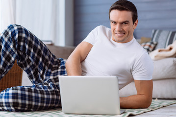 Nice attractive man working from home