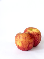 red fuji apple with half slice ,isolated on white