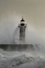 Dekokissen Old lighthouse covered by stormy waves © Zacarias da Mata