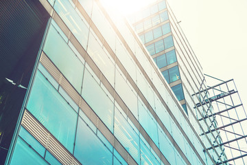 Fototapeta na wymiar glass facaded office building in shiny sunlight