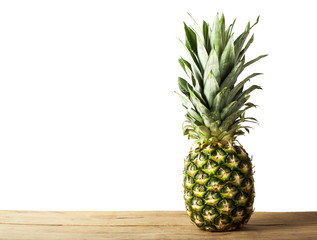 Ripe fresh pineapple isolated on white background