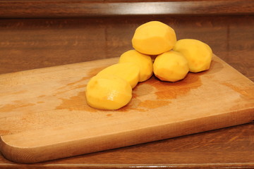 Potatoes on a cutting board