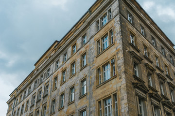 Fototapeta na wymiar building with orange marble facade