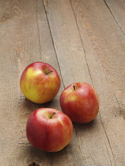 Apples on rustic wood
