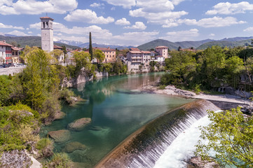 Beautiful panorama of Cividale del Friuli and of the waterfall on the Natisone river, Udine, Friuli Venezia Giulia, Italy