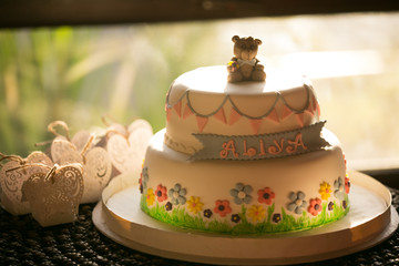 Delicious two storied birthday round cake for kid and baby for first year