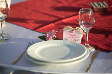 Empty dish and glass on table, dinner setting of table
