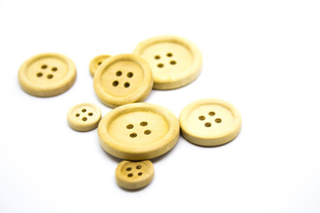Wooden Buttons on White Background