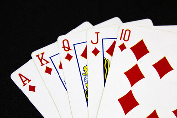 Royal Flush - Poker Hand on Black Background