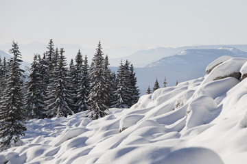 Fototapeta na wymiar Mountain range Zyuratkul. Forest and snowdrifts, winter landscap