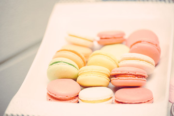 Red and yellow macaroons, sweets, shallow focus, vintage
