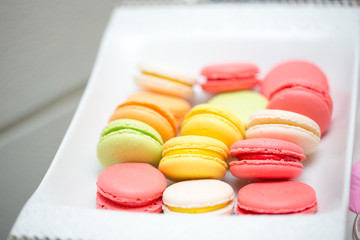 Red and yellow macaroons, sweets, shallow focus