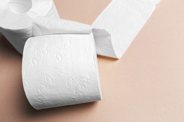 Toilet paper on pink background