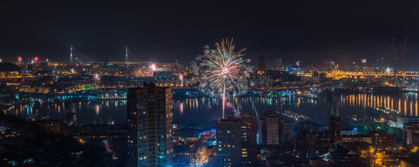 Colorful fireworks over city.