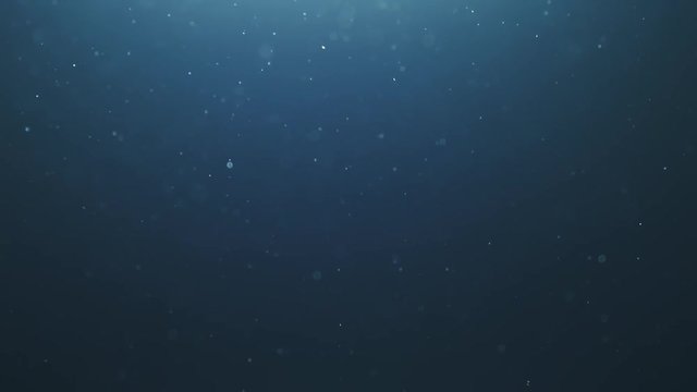 natural blue particles floating in slow motion over black background, 180fps prores slow motion
