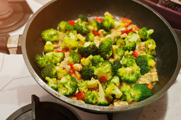 Mixed fresh vegetables in a skillet. Broccoli on frying pan