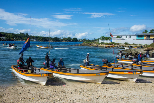 Banana boats transporting locals from Buka to Bougainville, Papua New Guinea