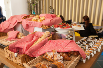 Setting of the table with food for breakfast, bread, beverage in  hotel, restaurant
