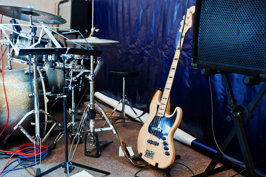 Set of musical instruments. Bass guitar and drums